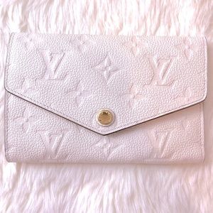 Louis Vuitton curieuse compact Neige empreinte wallet ski